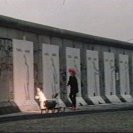 Burning in the silhouettes. The banners for the exhibition are on the wall. 		