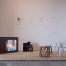 Doubleday 2008  lights, found table, chairs, speakers and amplifier, data projector and timber, animation 4:16 minutes looped, installation view at TarraWarra Museum of Art, Healsville, Victoria 480.0 x 240.0 x 240.0 cm