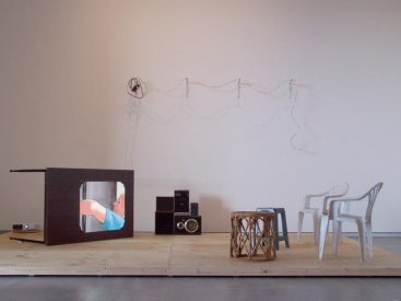 Doubleday 2008  lights, found table, chairs, speakers and amplifier, data projector and timber, animation 4:16 minutes looped, installation view at TarraWarra Museum of Art, Healsville, Victoria 480.0 x 240.0 x 240.0 cm