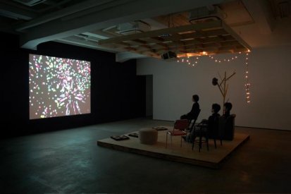 The Drunken Soldier 2008  timber and recycled furniture, lights and packing palettes, bamboo hat stand by Nadine Christensen 330.0 x 330.0 x 250.0 cm (installation view at Tokyo Wonder Site, Tokyo, Japan)